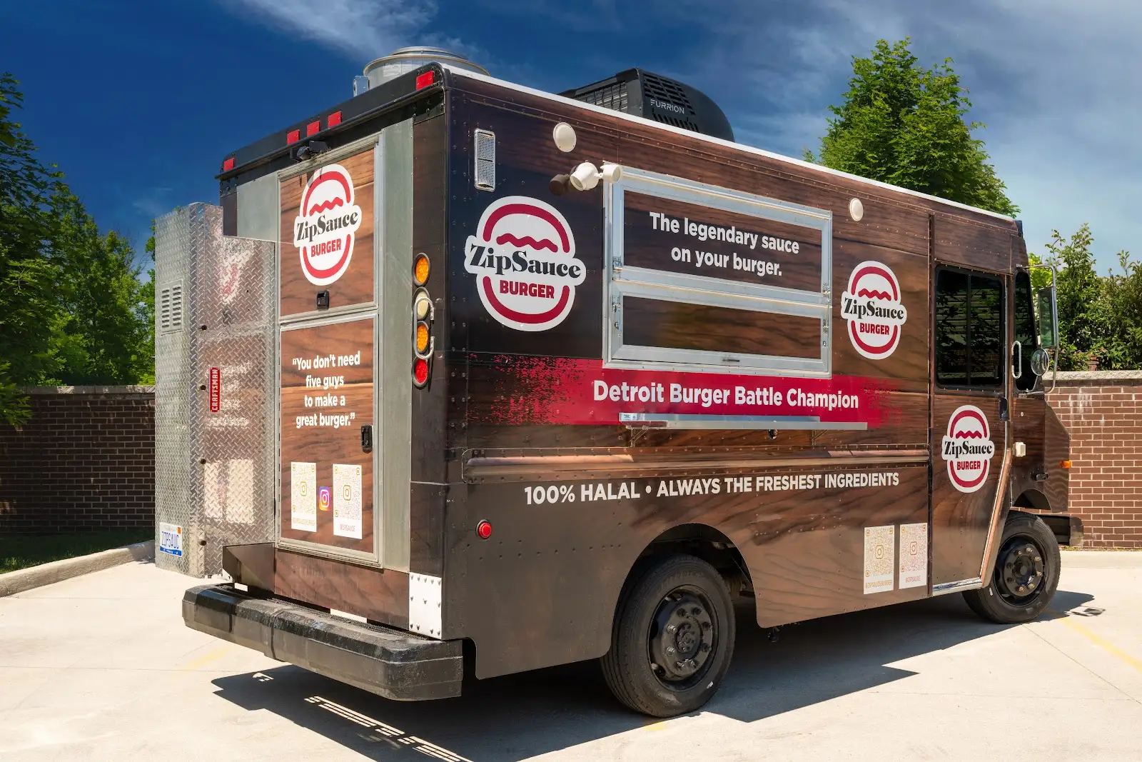 ZipSauce Burger food truck rear view with Detroit Burger Battle Champion graphics